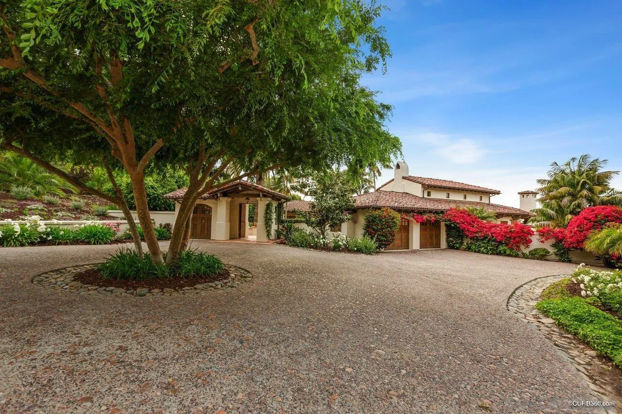 5530 Codorniz Rancho Santa Fe, CA 92067 - Photo 3 of 37 a front view of a house with garden