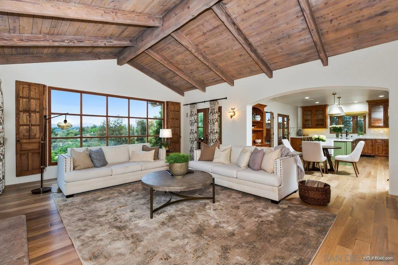 5530 Codorniz Rancho Santa Fe, CA 92067 - Photo 8 of 37 a living room with furniture and a large window