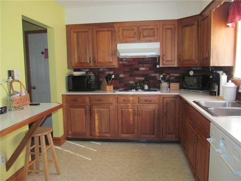 476 Shapleigh Corner Road Shapleigh, ME 04076 - Photo 3 of 22 Kitchen. Pretty solid wood cabinets...