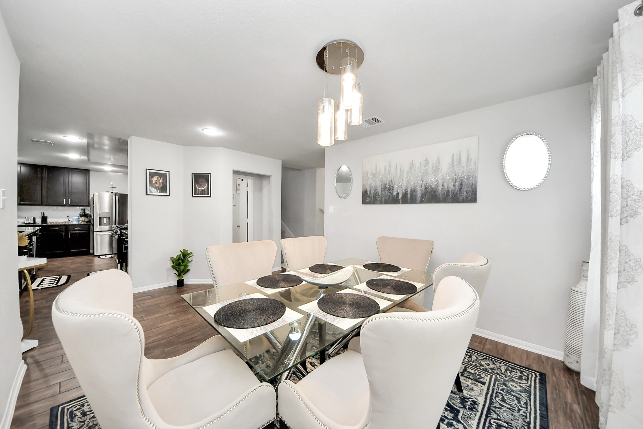 2643 Ridgeback Drive Rosenberg, TX 77471 - Photo 11 of 46 a dining room with furniture and a chandelier