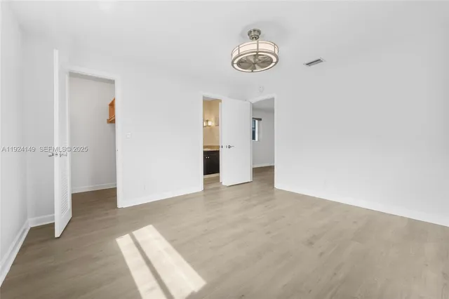 a view of a room with an empty space