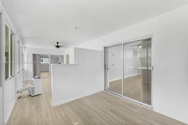 a view of livingroom with furniture and wooden floor