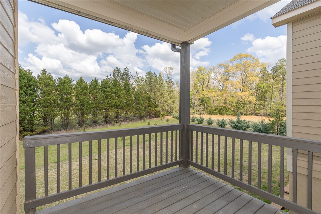 22 Old American Boulevard Pendleton, SC 29670 - Photo 18 of 49 Enjoy tranquil views from this spacious outdoor area, ideal for relaxation and entertaining.