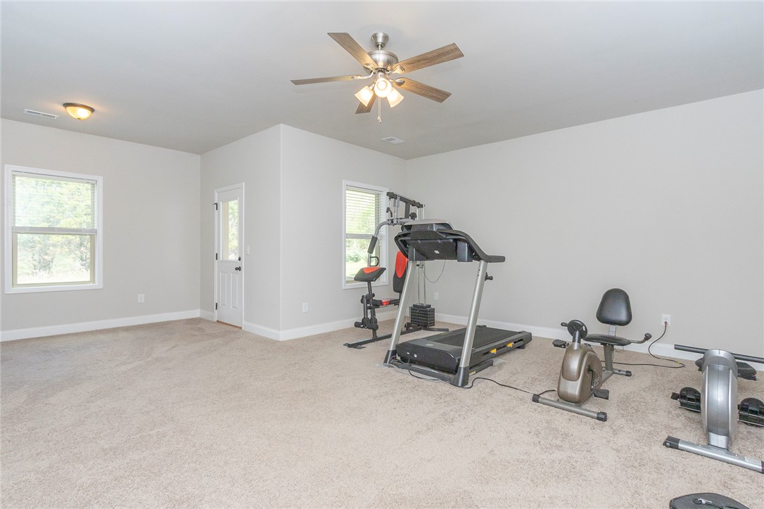 22 Old American Boulevard Pendleton, SC 29670 - Photo 34 of 49 This spacious room offers versatile use with natural light and a comforting ambiance.