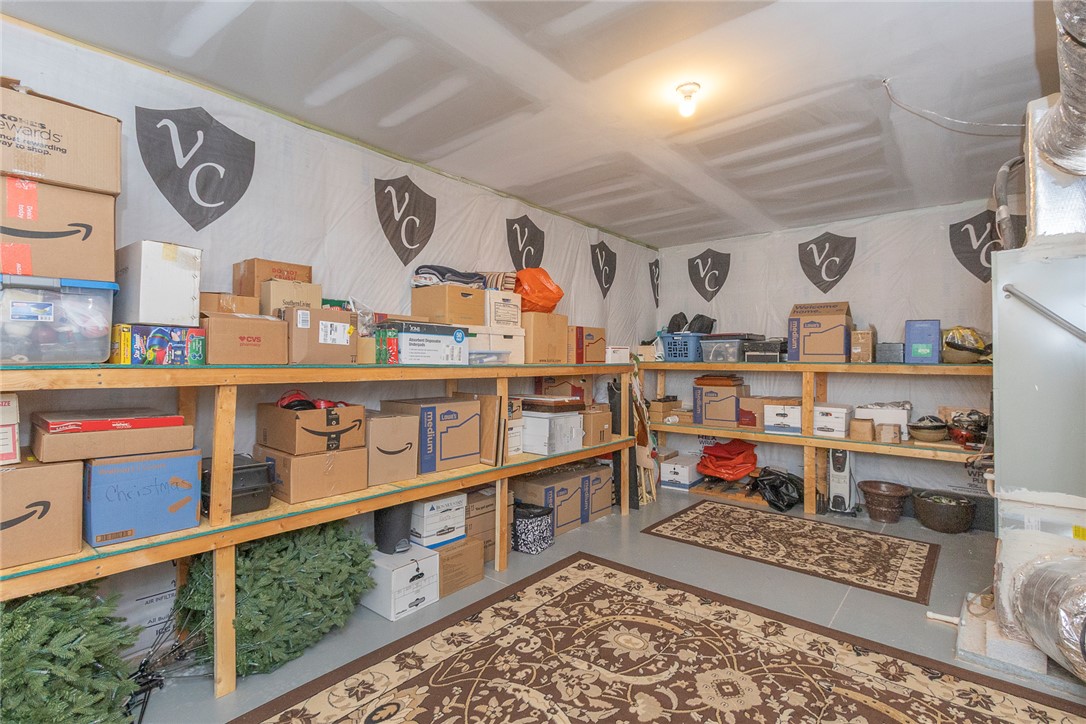 22 Old American Boulevard Pendleton, SC 29670 - Photo 36 of 49 This versatile storage room offers ample shelving for organized living and easy access.