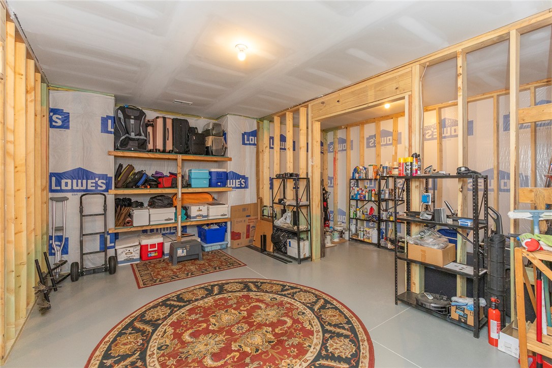 22 Old American Boulevard Pendleton, SC 29670 - Photo 37 of 49 This spacious utility area offers abundant storage solutions for organized living.