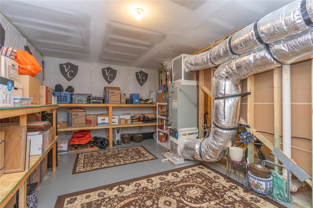 22 Old American Boulevard Pendleton, SC 29670 - Photo 40 of 49 This organized storage area features exposed ductwork and ample shelving for all your organizational needs.