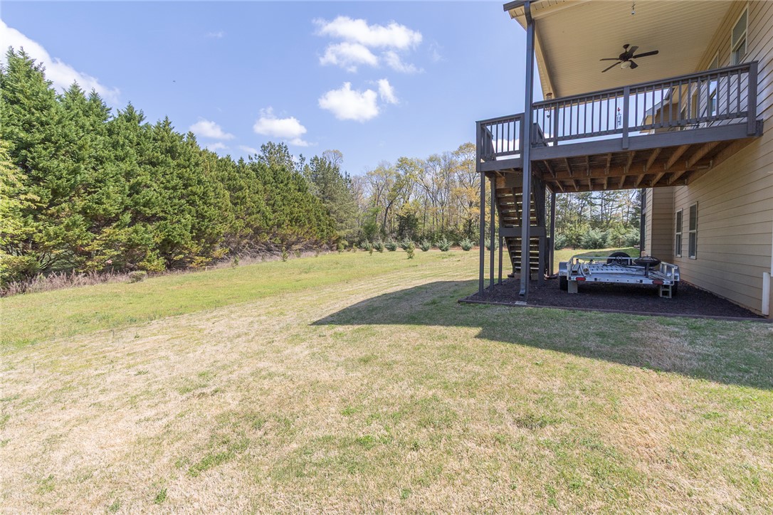 22 Old American Boulevard Pendleton, SC 29670 - Photo 45 of 49 This residence features a spacious backyard with a deck for outdoor enjoyment.