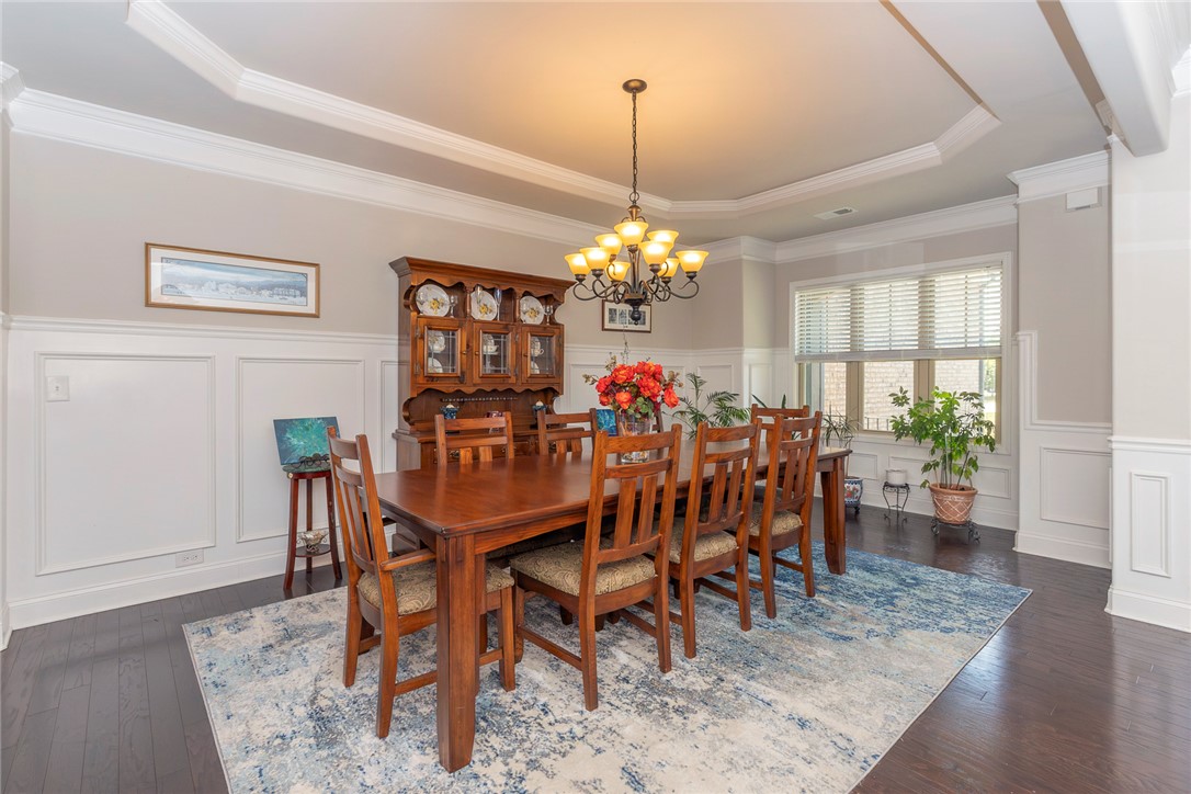 22 Old American Boulevard Pendleton, SC 29670 - Photo 6 of 49 This dining room offers refined architectural details and ample space for gatherings.