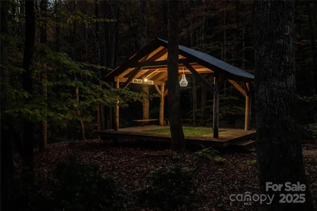 a view of a backyard of the house