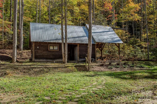 a view of a chairs and table in the garden