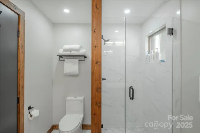 a view of a livingroom with furniture and window