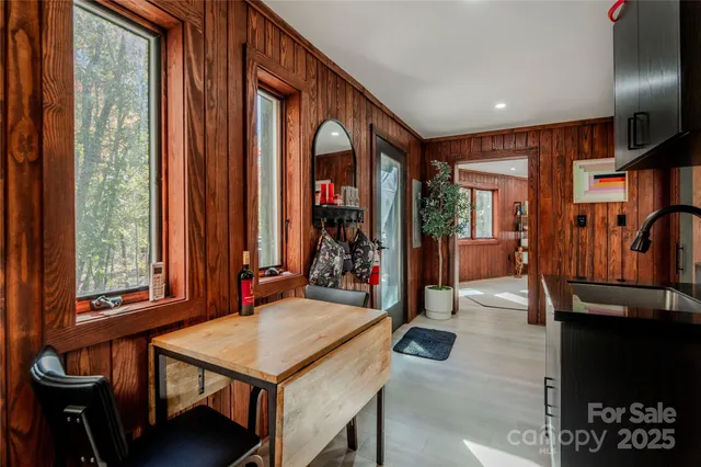 a view of a balcony with furniture