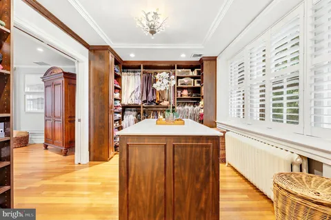 a kitchen with a stove a sink and a refrigerator