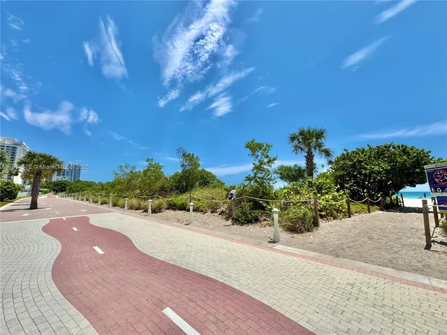 a view of a backyard of a house