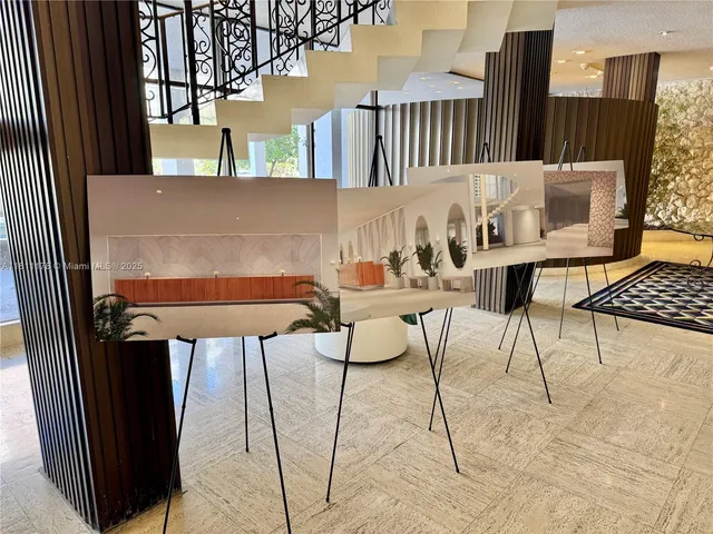 a utility room with a window and a white counter