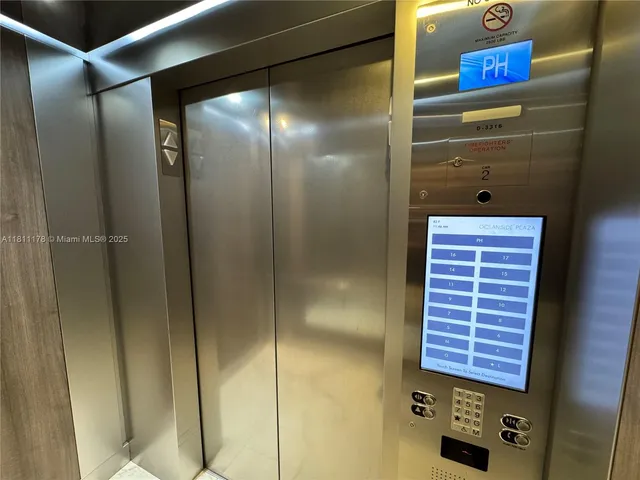 a bathroom with a shower and a glass door shower