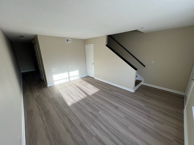 622 Castlegate Drive Nashville, TN 37217 - Photo 8 of 16 wooden floor in an empty room with a window
