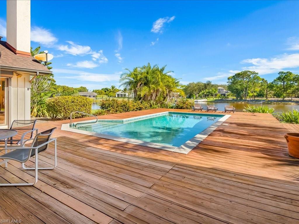 154 Cajeput Drive Naples, FL 34108 - Photo 19 of 45 a view of an ocean from a balcony