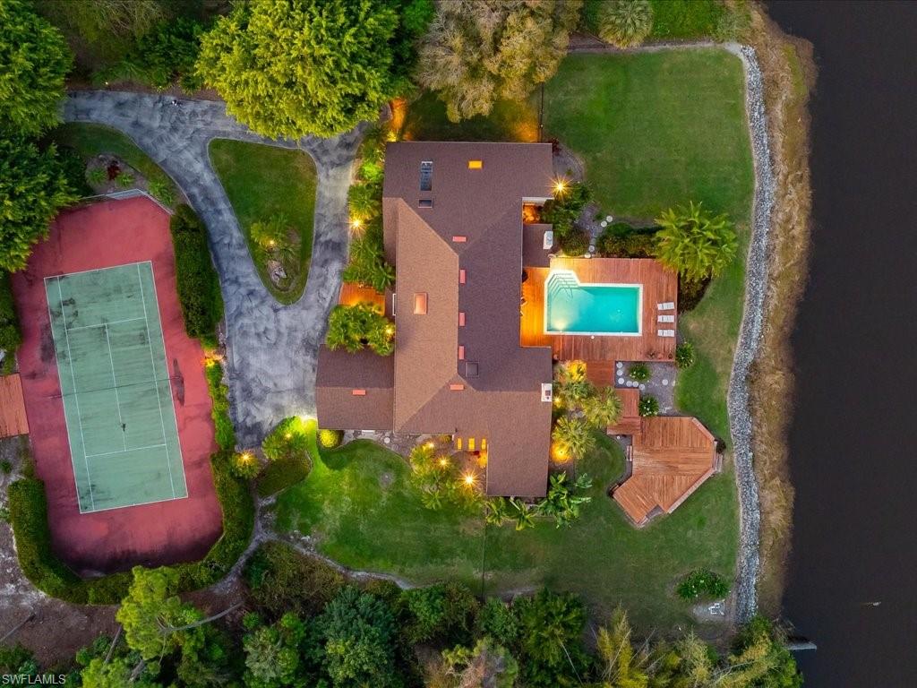 154 Cajeput Drive Naples, FL 34108 - Photo 6 of 45 an aerial view of a house