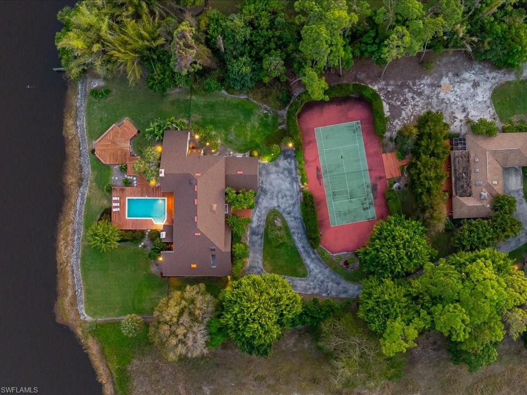 154 Cajeput Drive Naples, FL 34108 - Photo 7 of 45 an aerial view of a house