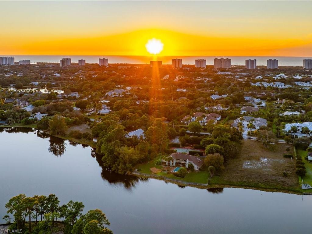 154 Cajeput Drive Naples, FL 34108 - Photo 8 of 45 an aerial view of multiple house