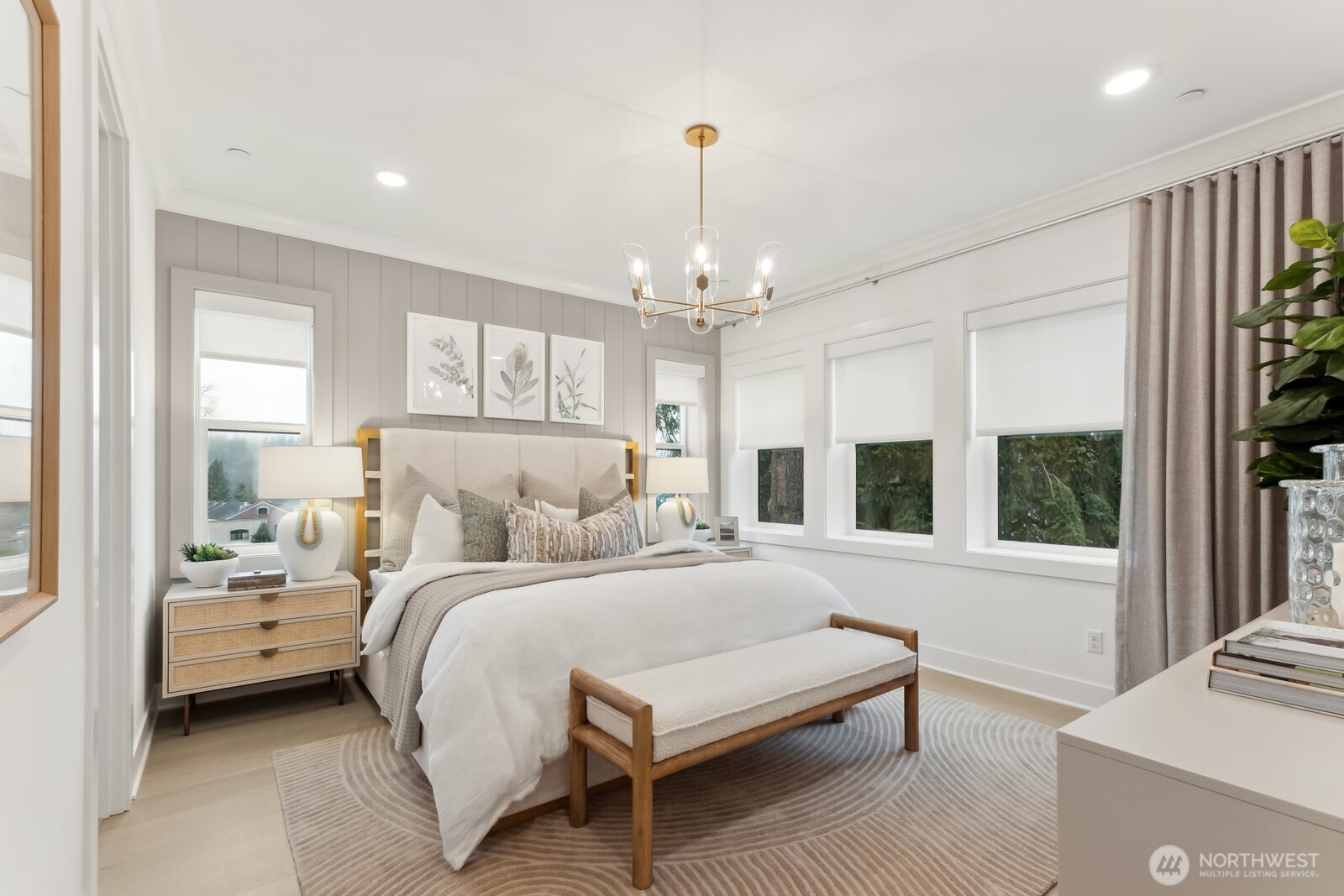 18923 99th Place Northeast, Unit A Bothell, WA 98011 - Photo 13 of 27 a spacious bedroom with a bed and a large window