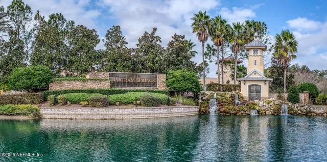 a view of house with yard and outdoor space
