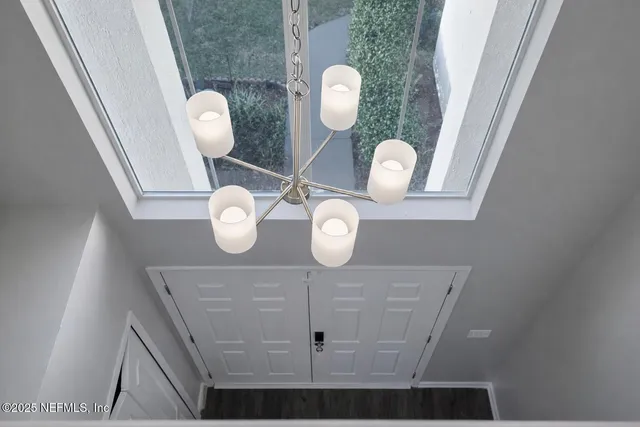 a close view of light fixtures and window
