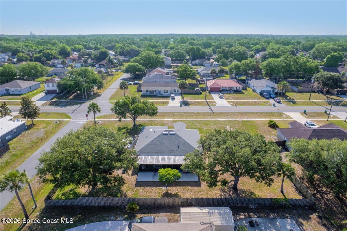 5975 Aruin Street Cocoa, FL 32927 - Photo 53 of 70 an aerial view of residential houses with outdoor space and swimming pool