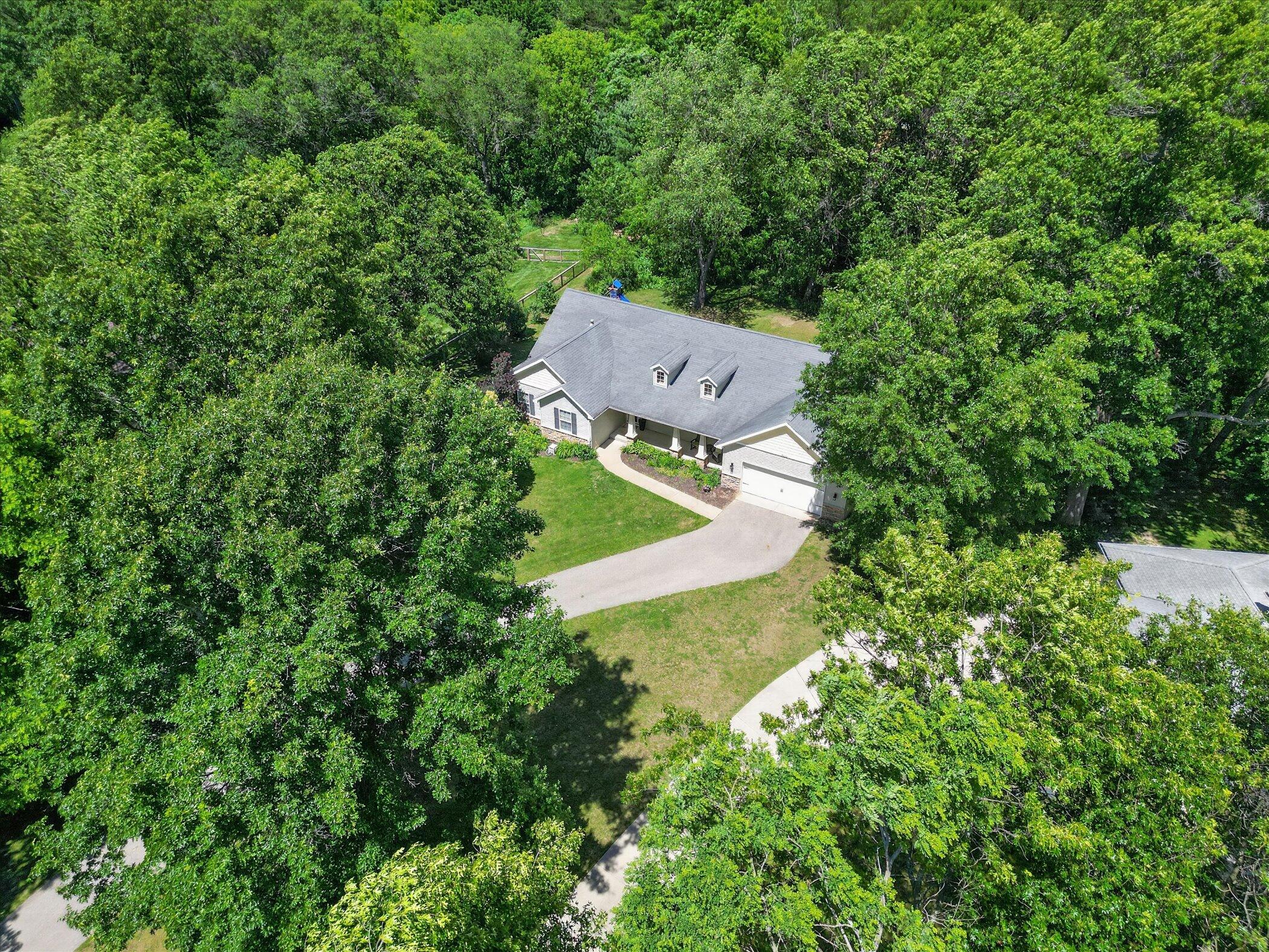 8669 Lilly Ridge Drive Alto, MI 49302 - Photo 52 of 53 58-8669-Lilly-Ridge-Dr-Alto-WindowStill