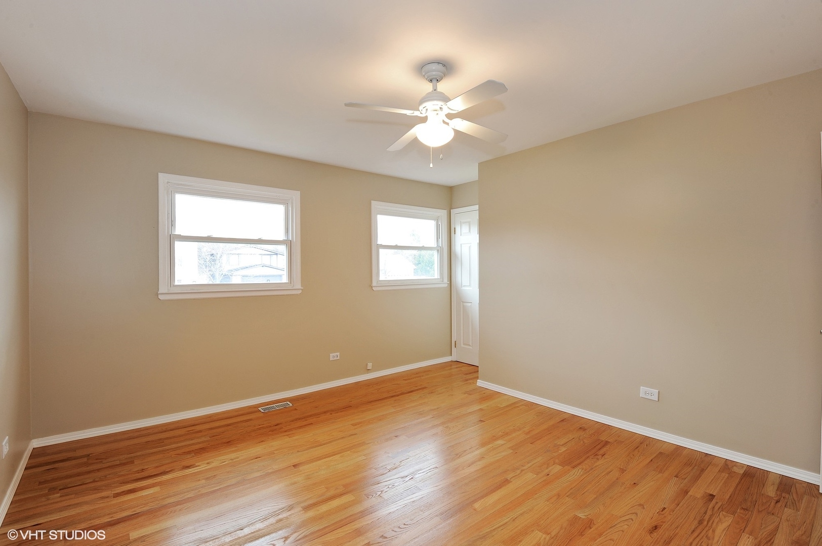 147 Spring Avenue Glen Ellyn, IL 60137 - Photo 10 of 14 a view of wooden floor and windows in a room