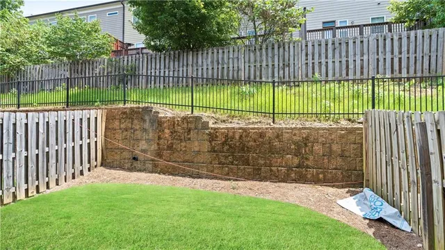 a view of outdoor space with a fence