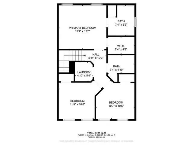 a picture of a bench in front of a wall