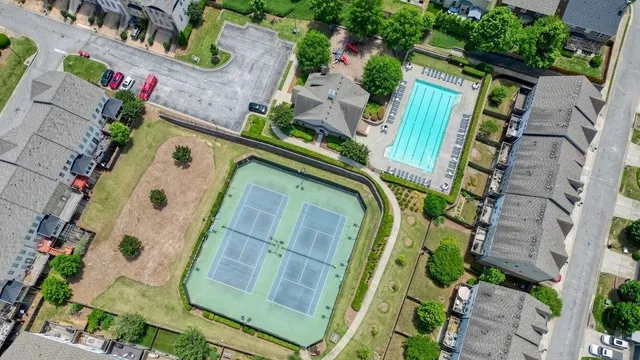 an aerial view of a house with swimming pool