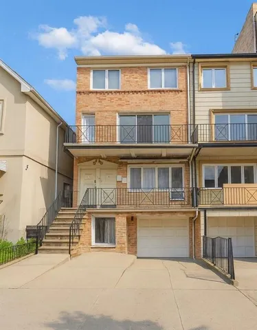 a front view of residential houses