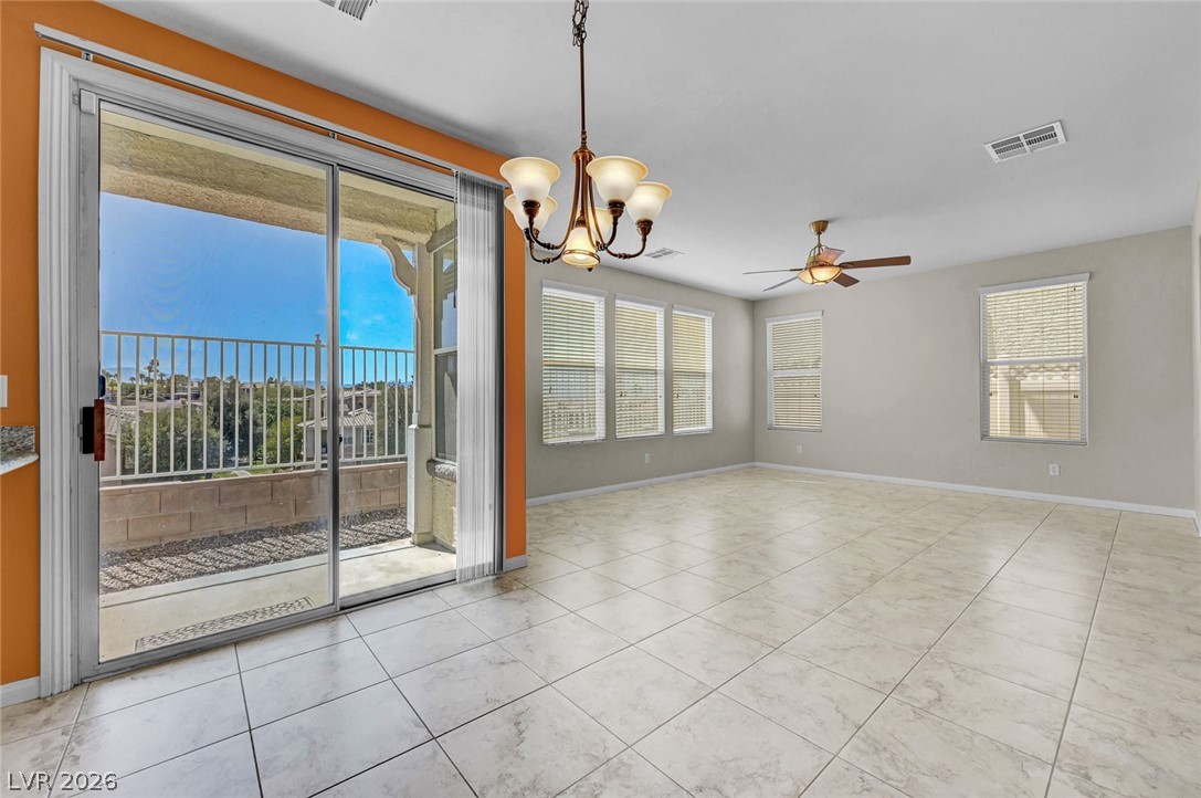 977 Sparkling Light Street Henderson, NV 89052 - Photo 4 of 75 Bright and airy interior space with ample natural light and a balcony for outdoor enjoyment.