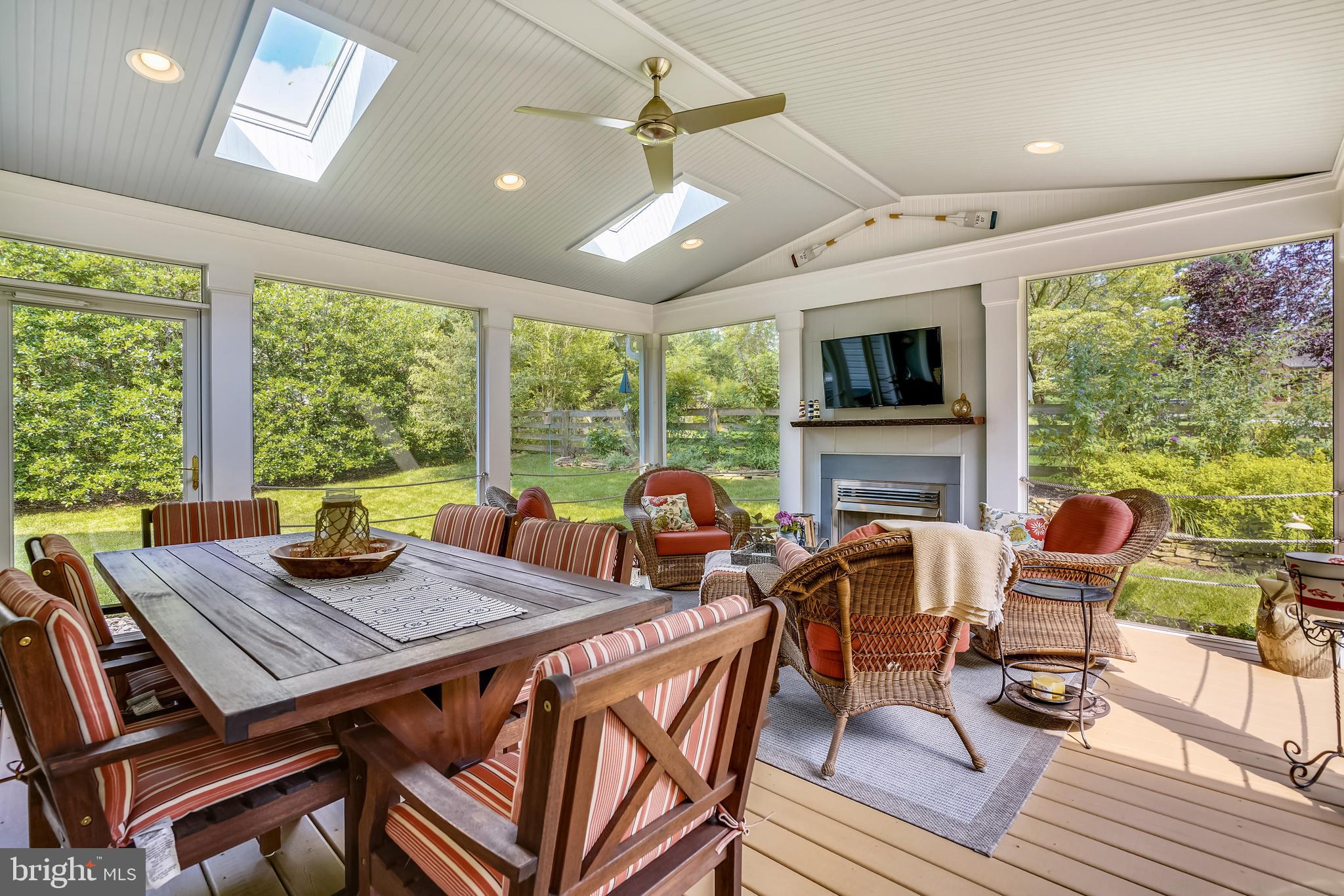 2320 Ridge Tree Court Ellicott City, MD 21042 - Photo 3 of 37 Screened Porch w/skylights & GasFireplace.