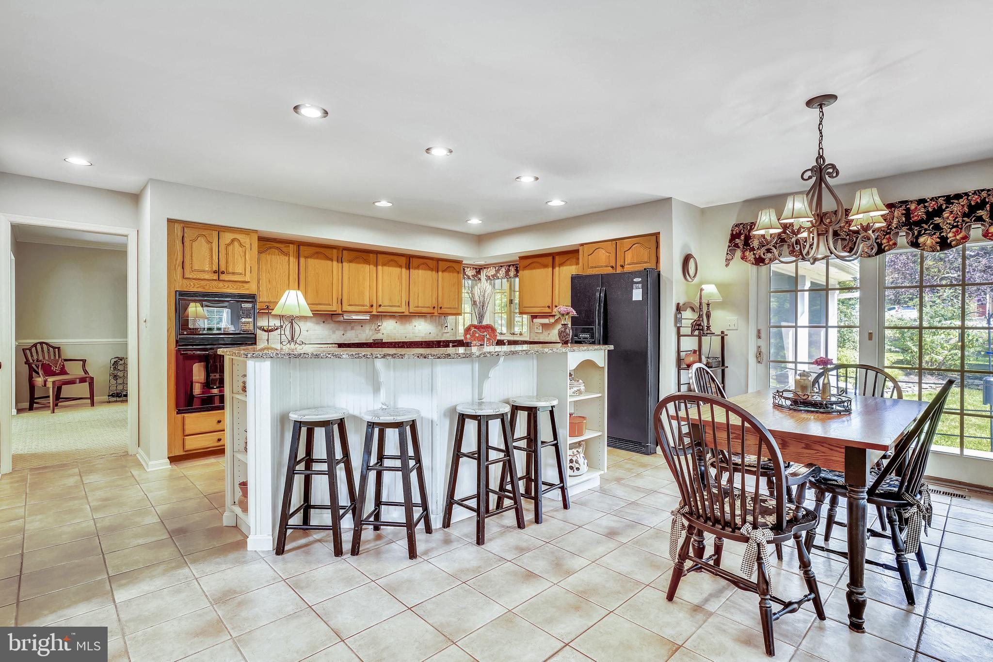 2320 Ridge Tree Court Ellicott City, MD 21042 - Photo 7 of 37 Kitchen with large island for seating & food prep.