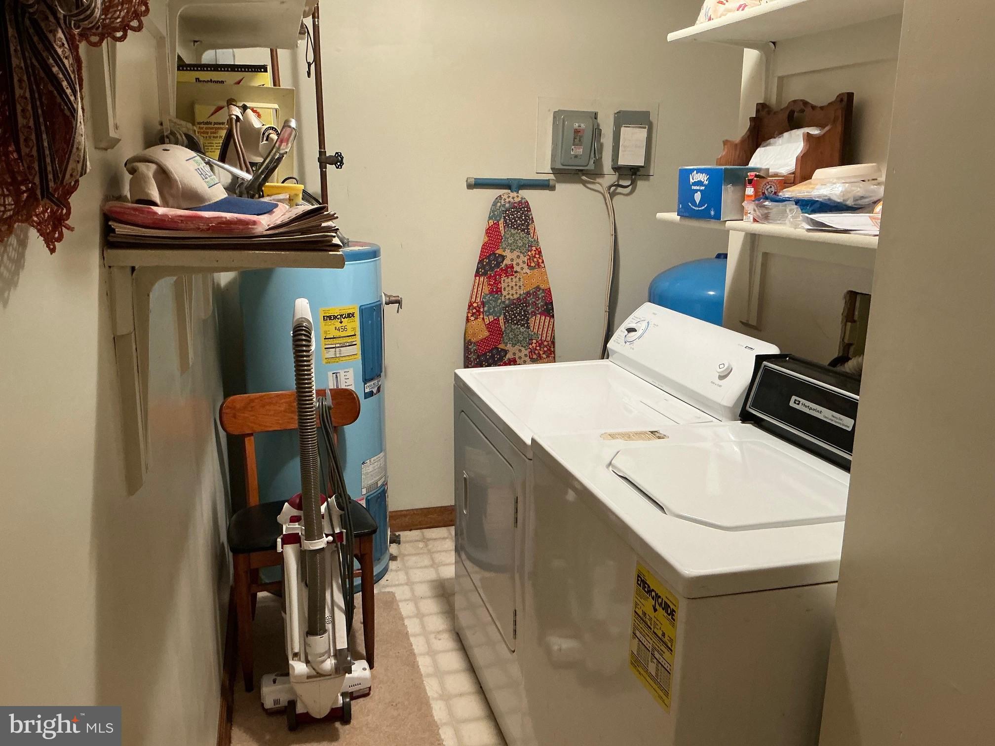 7206 Old Dickersons Road Orange, VA 22960 - Photo 13 of 32 a utility room with dryer washer and other items