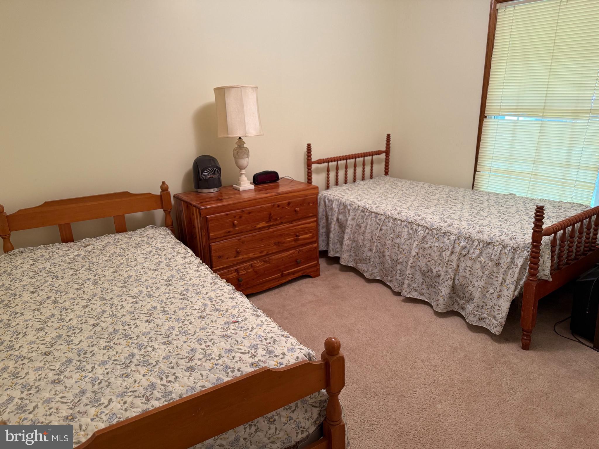 7206 Old Dickersons Road Orange, VA 22960 - Photo 20 of 32 a bedroom with a bed and a window