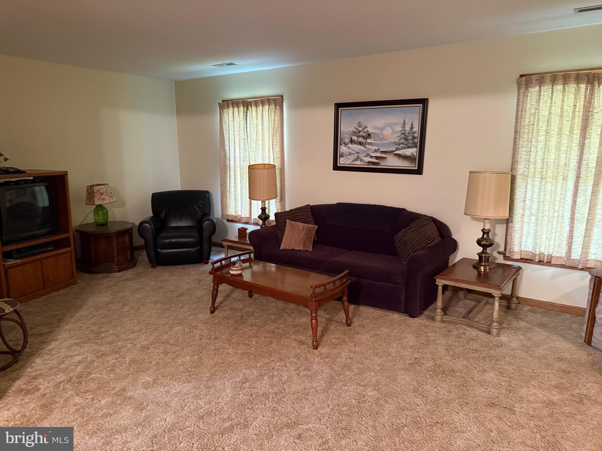 7206 Old Dickersons Road Orange, VA 22960 - Photo 5 of 32 a living room with furniture and a flat screen tv