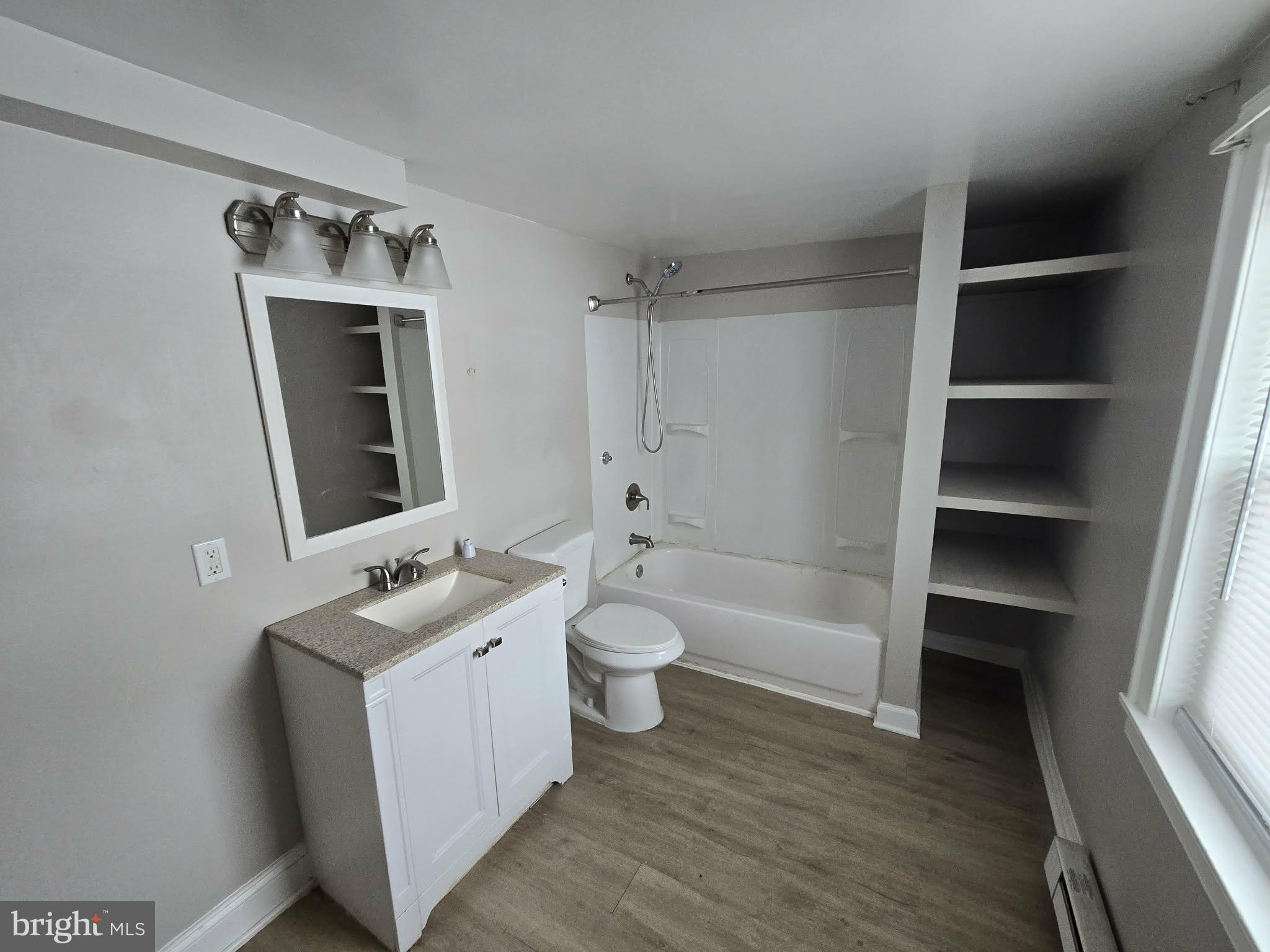 21328 Mt Lena Road Boonsboro, MD 21713 - Photo 11 of 21 a bathroom with a toilet sink and mirror