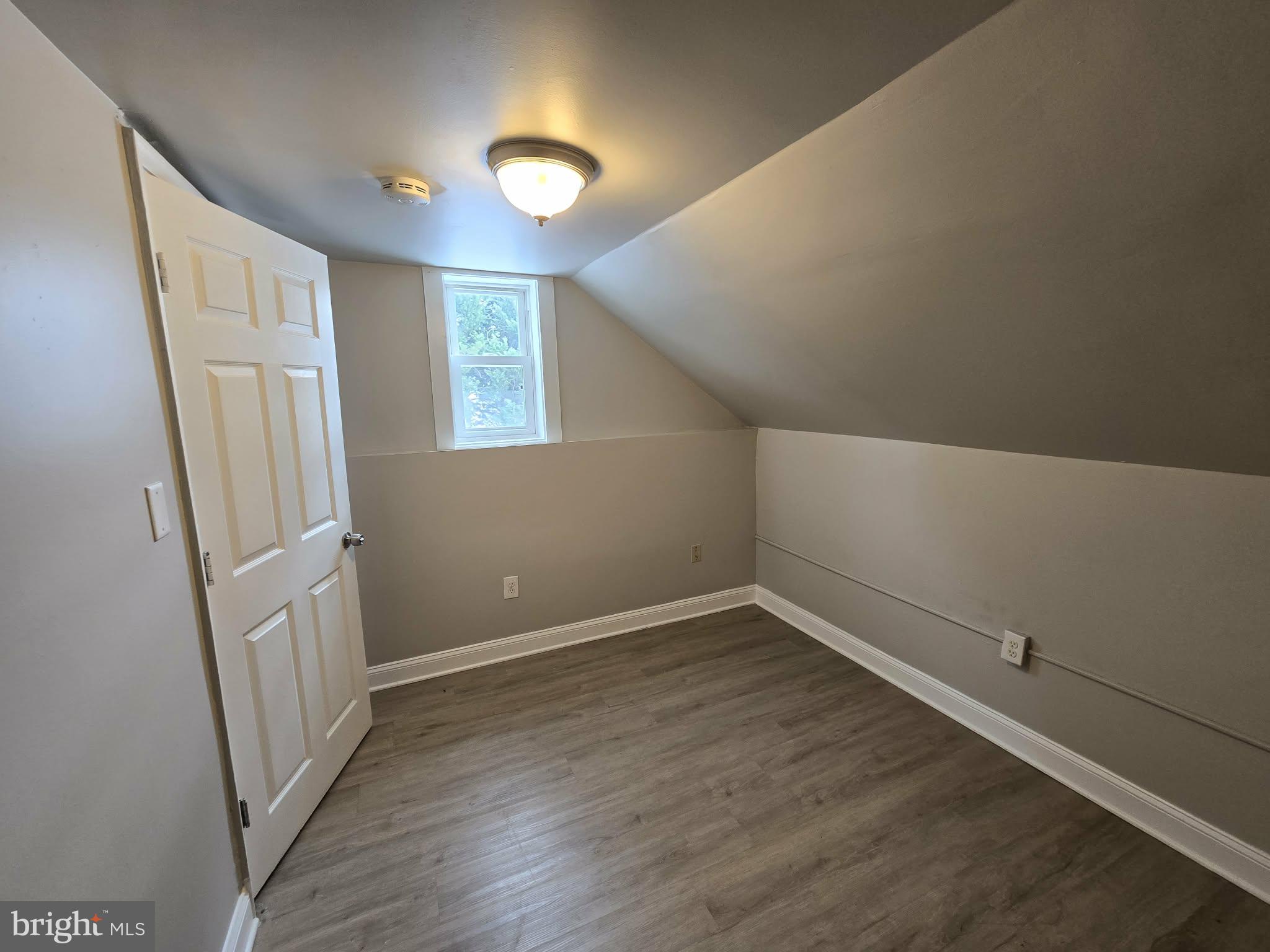 21328 Mt Lena Road Boonsboro, MD 21713 - Photo 17 of 21 an empty room with wooden floor and windows