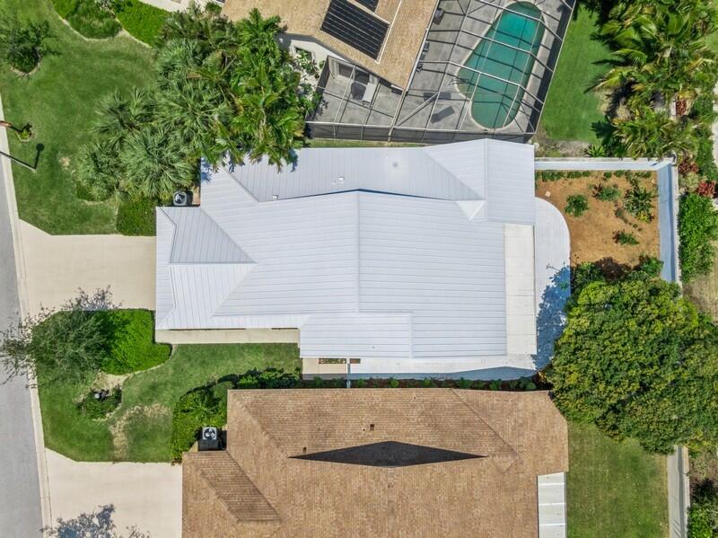 103 Landward Drive Jupiter, FL 33477 - Photo 31 of 39 Seamless Metal Roof 2022