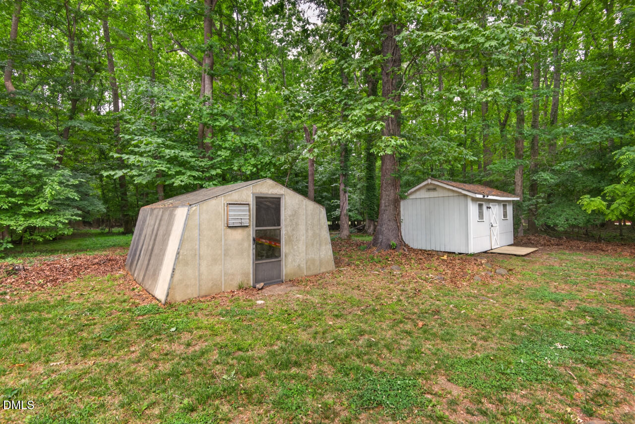 1420 Goodwin Road Durham, NC 27712 - Photo 42 of 54 a house view with a backyard space