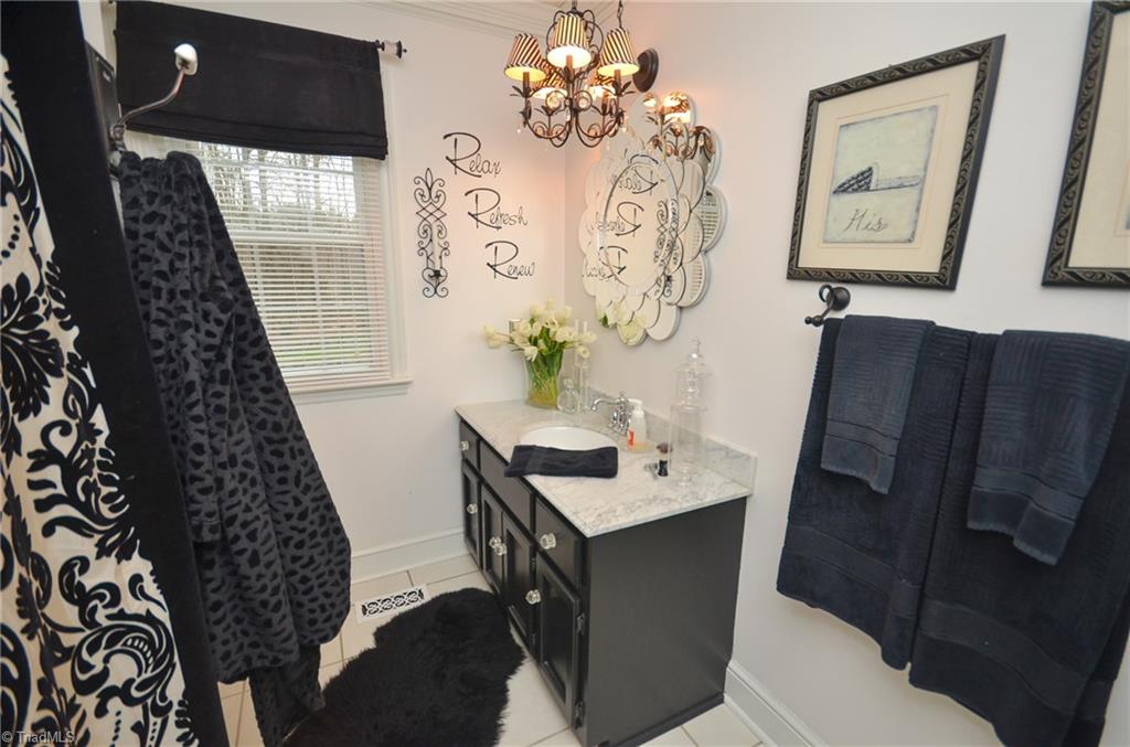 1434 Talbot Road Pleasant Garden, NC 27313 - Photo 15 of 30 Full bath main floor, tile flooring