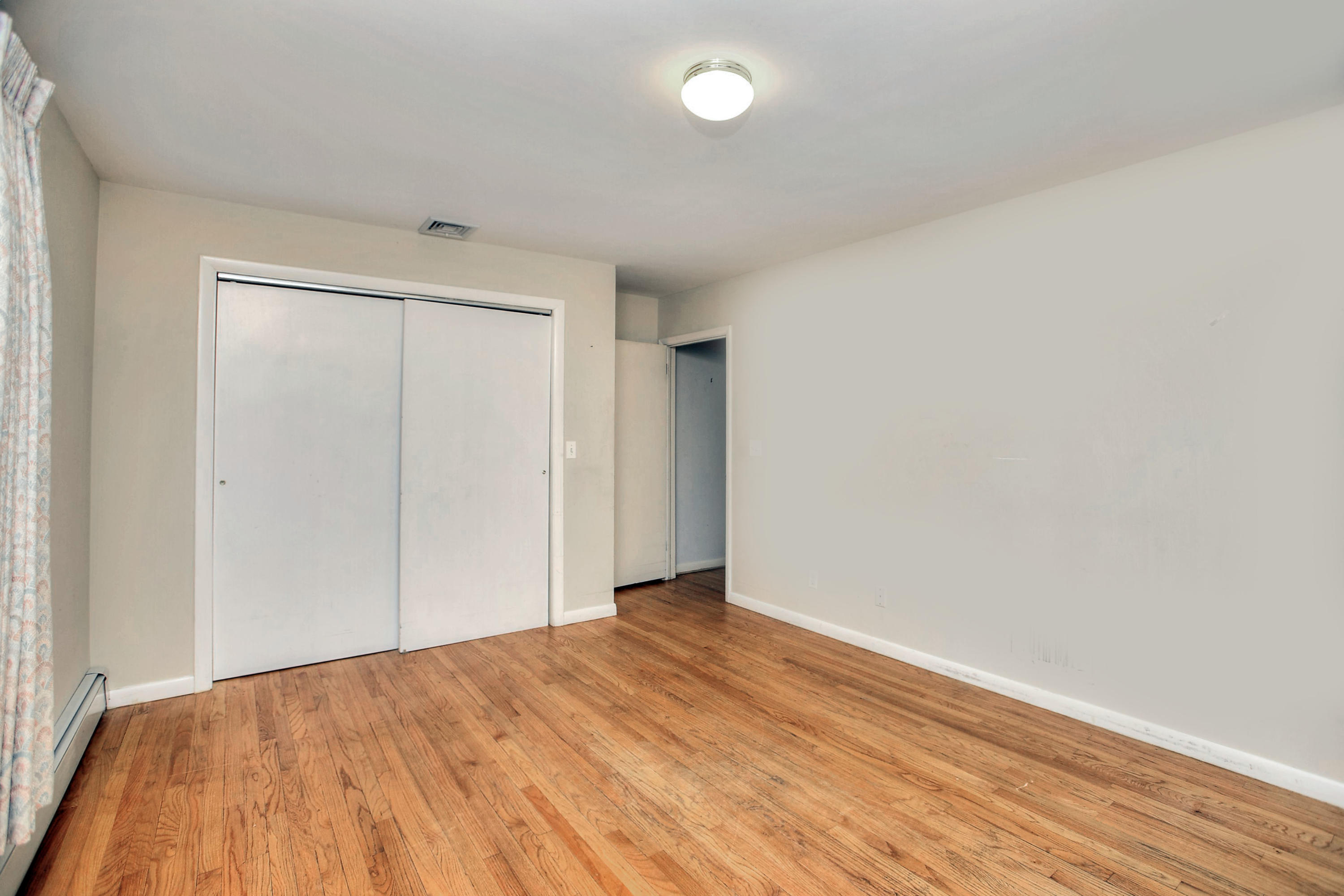 853 Valley Road New Canaan, CT 06840 - Photo 22 of 30 a view of empty room