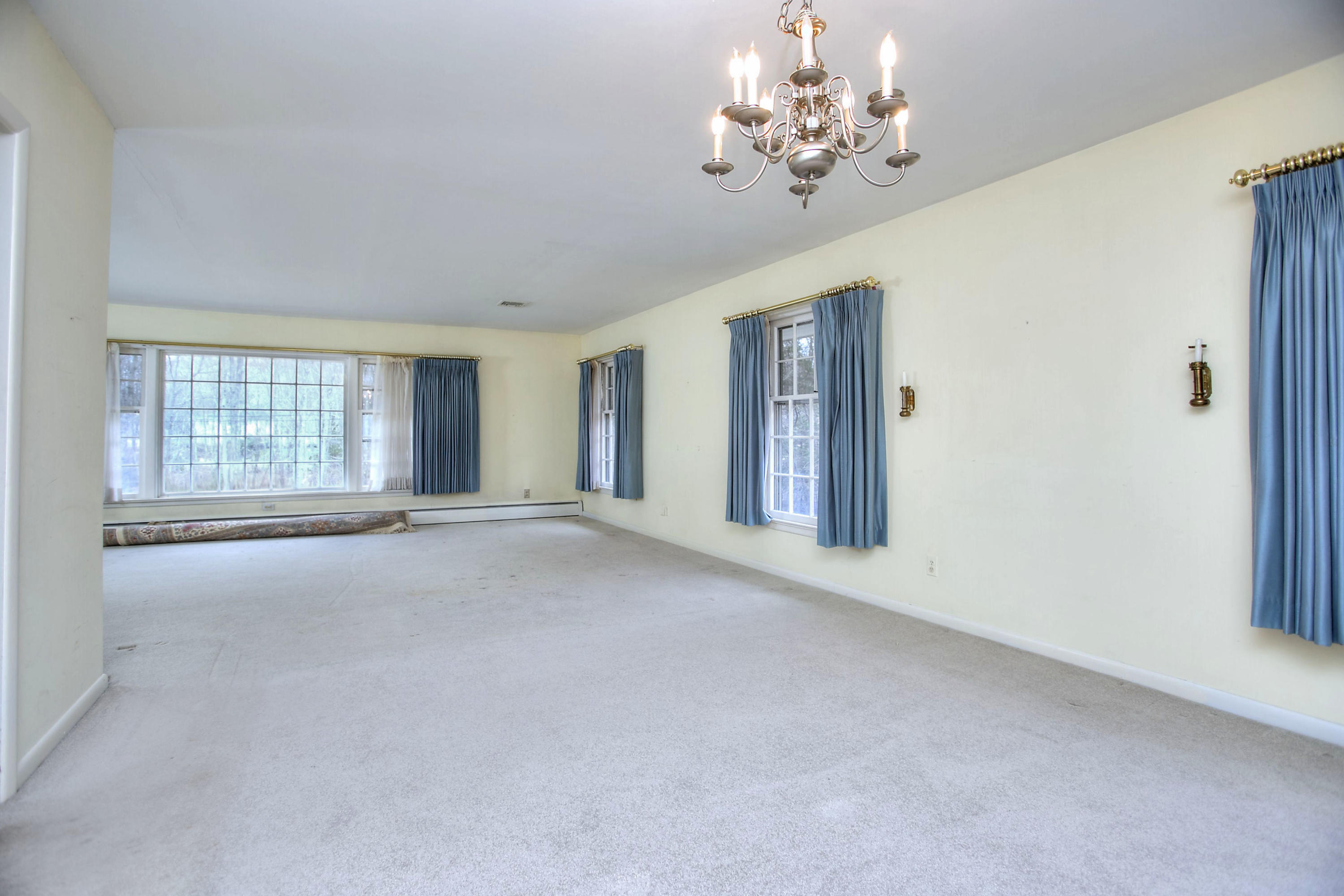 853 Valley Road New Canaan, CT 06840 - Photo 7 of 30 a view of an empty room with a window