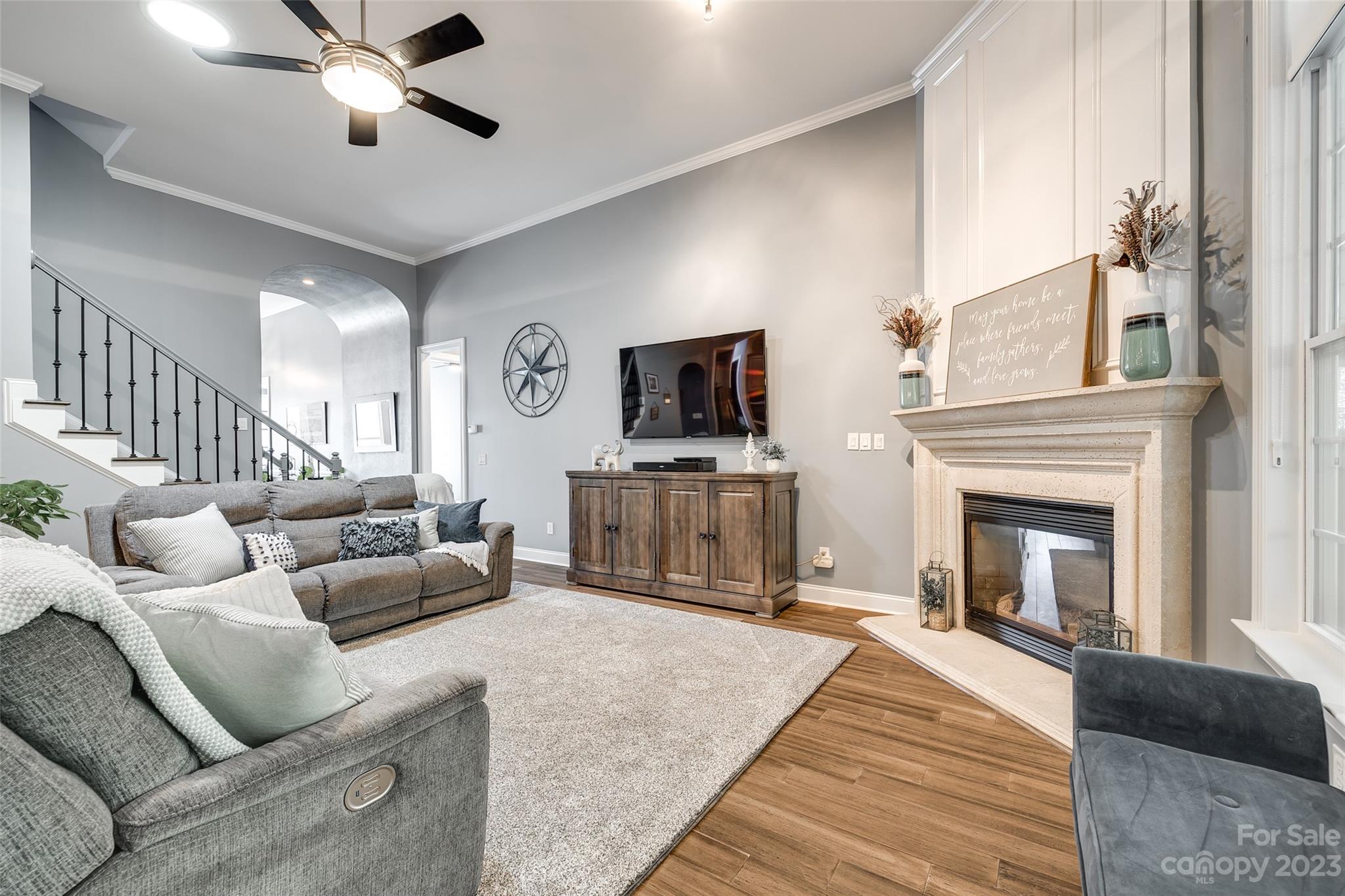 675 Quicksilver Trail Fort Mill, SC 29708 - Photo 12 of 48 a living room with furniture and a fireplace
